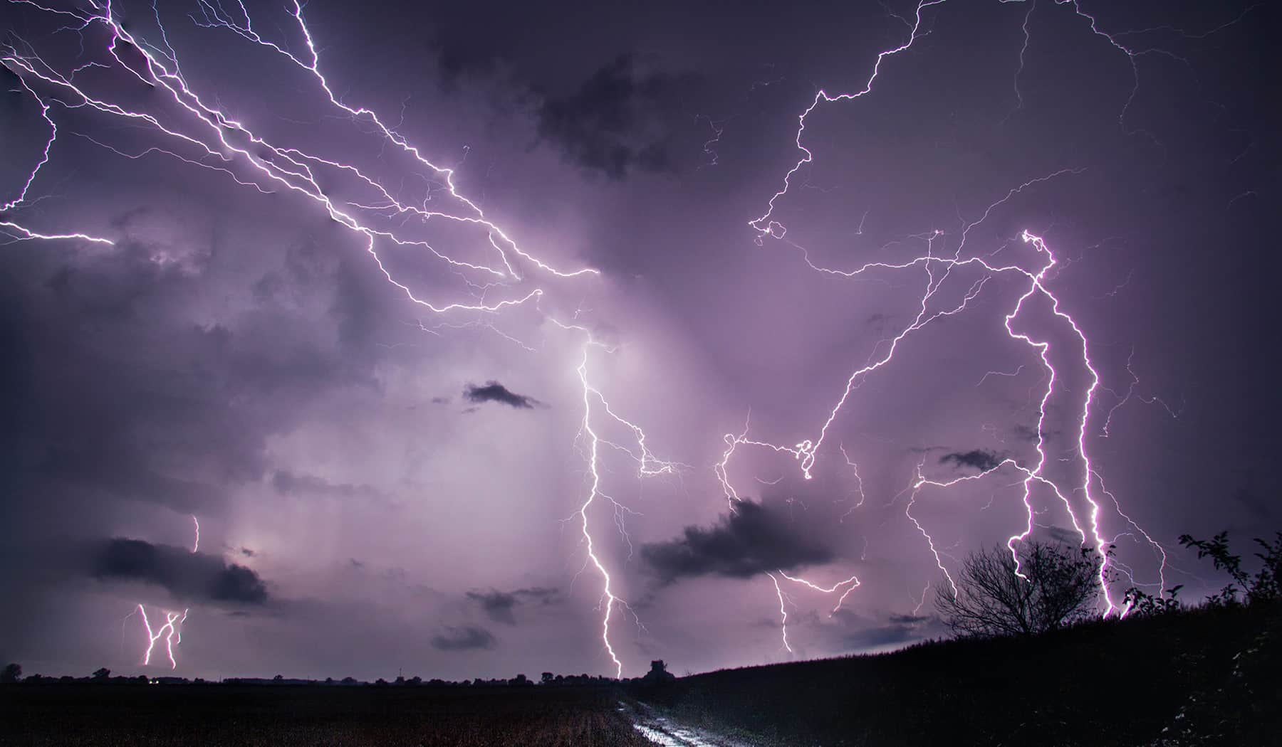 A dark sky is electrified with of lightning, photo by NOAA